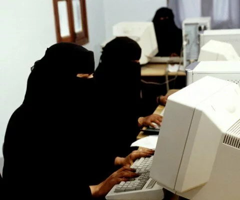 Veiled Yemeni women in computer class, Taiz Yemen.