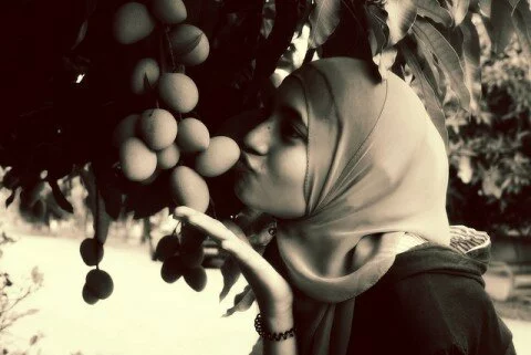 Young Beautiful Lady kissing fruit
