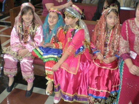 Young Iranian-American girls dressed in traditional Persian garb for Norooz
